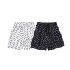 BALENCIAGA 발렌시아가 6455 올오버 로고 프린트 스윔 쇼츠